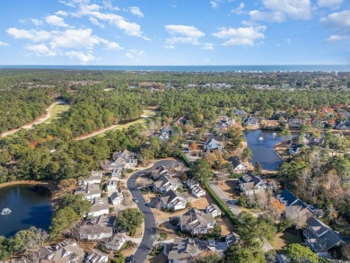 Immaculate Lakefront Gem in the Heart of Pawleys Island  Nestled on The Reserve Golf Club at Pawleys Island in South Carolina - for sale on GolfHomes.com, golf home, golf lot