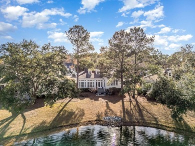 Immaculate Lakefront Gem in the Heart of Pawleys Island  Nestled on The Reserve Golf Club at Pawleys Island in South Carolina - for sale on GolfHomes.com, golf home, golf lot