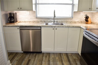 If you've ever felt that life after 55 should be laid back and on Sunrise Lakes Phase IV Golf Course in Florida - for sale on GolfHomes.com, golf home, golf lot