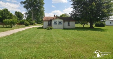 Discover the potential of this 2/3-bedroom ranch home situated on Dundee Golf Club in Michigan - for sale on GolfHomes.com, golf home, golf lot