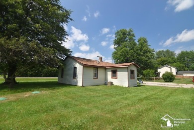 Discover the potential of this 2/3-bedroom ranch home situated on Dundee Golf Club in Michigan - for sale on GolfHomes.com, golf home, golf lot