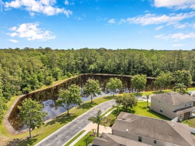 Conservation Lot. Furnished. Front Pond View. Single-story home on Meadow Oaks Golf and Country Club in Florida - for sale on GolfHomes.com, golf home, golf lot