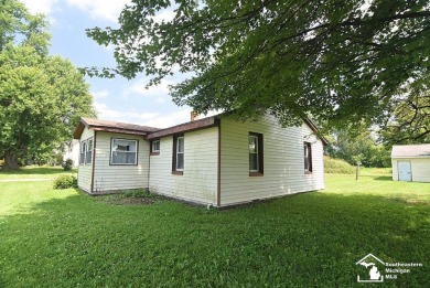 Discover the potential of this 2/3-bedroom ranch home situated on Dundee Golf Club in Michigan - for sale on GolfHomes.com, golf home, golf lot