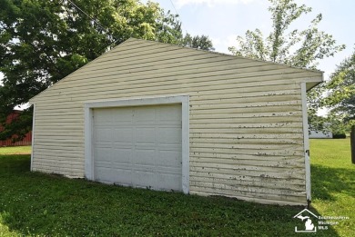 Discover the potential of this 2/3-bedroom ranch home situated on Dundee Golf Club in Michigan - for sale on GolfHomes.com, golf home, golf lot