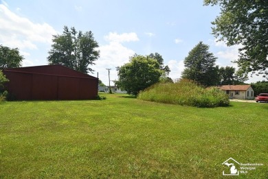Discover the potential of this 2/3-bedroom ranch home situated on Dundee Golf Club in Michigan - for sale on GolfHomes.com, golf home, golf lot