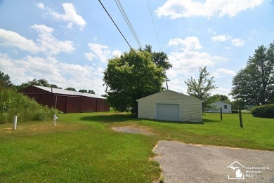 Discover the potential of this 2/3-bedroom ranch home situated on Dundee Golf Club in Michigan - for sale on GolfHomes.com, golf home, golf lot