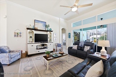 2003 Addison Osprey pool home on .32 acre backing to on Glen Lakes Country Club in Florida - for sale on GolfHomes.com, golf home, golf lot