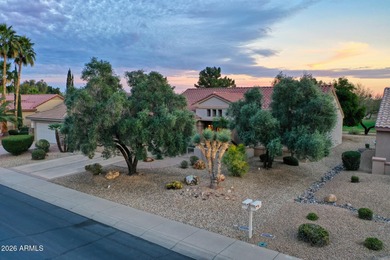 Popular Cholla on a Golf Course Lot! Welcoming curb appeal on Sun City Grand Golf Couse and Club in Arizona - for sale on GolfHomes.com, golf home, golf lot