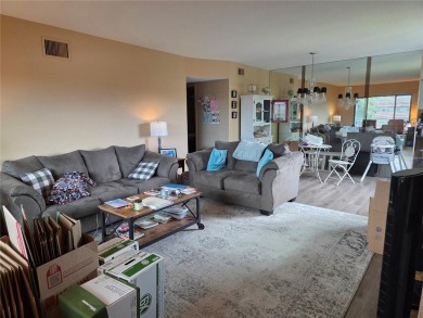 PRICED REDUCED!   Desirable 1,400 sq ft end unit, 2 bed/2 bath on On Top Of The World Golf Course in Florida - for sale on GolfHomes.com, golf home, golf lot
