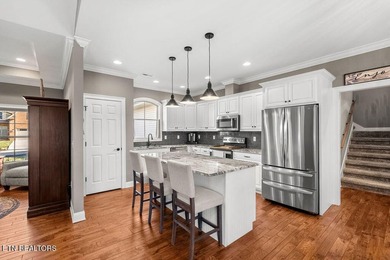 Welcome to 304 Elokwa Lane! Discover comfort and style in this on Toqua Golf Course - Loudon County in Tennessee - for sale on GolfHomes.com, golf home, golf lot