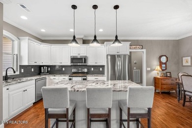 Welcome to 304 Elokwa Lane! Discover comfort and style in this on Toqua Golf Course - Loudon County in Tennessee - for sale on GolfHomes.com, golf home, golf lot