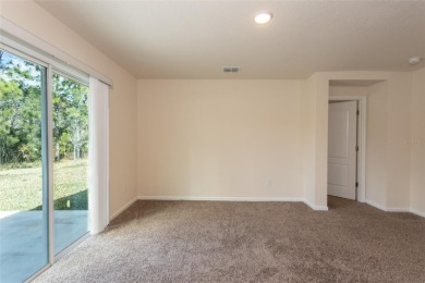 Come see this four bedroom, two bath, with attached 2 car garage on Grand Reserve Golf Course in Florida - for sale on GolfHomes.com, golf home, golf lot