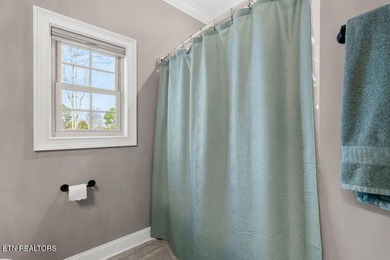 Welcome to 304 Elokwa Lane! Discover comfort and style in this on Toqua Golf Course - Loudon County in Tennessee - for sale on GolfHomes.com, golf home, golf lot