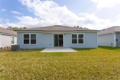 Come see this four bedroom, two bath, with attached 2 car garage on Grand Reserve Golf Course in Florida - for sale on GolfHomes.com, golf home, golf lot