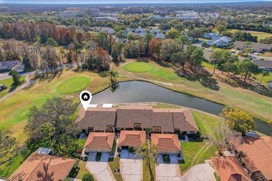 Welcome to 3454 Niblick Court, a beautifully maintained end-unit on Seven Springs Golf and Country Club in Florida - for sale on GolfHomes.com, golf home, golf lot