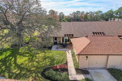 Welcome to 3454 Niblick Court, a beautifully maintained end-unit on Seven Springs Golf and Country Club in Florida - for sale on GolfHomes.com, golf home, golf lot