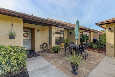 Welcome to 3454 Niblick Court, a beautifully maintained end-unit on Seven Springs Golf and Country Club in Florida - for sale on GolfHomes.com, golf home, golf lot