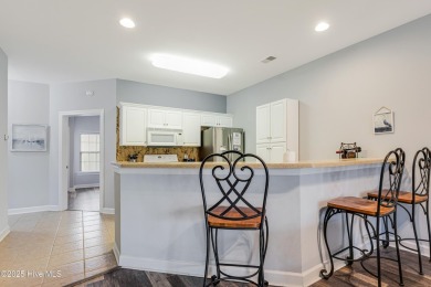 Fantastic Price on this beautiful, second-floor at 142 Avian Dr on Sea Trail Golf Resort in North Carolina - for sale on GolfHomes.com, golf home, golf lot