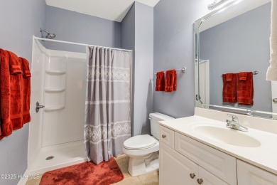 Fantastic Price on this beautiful, second-floor at 142 Avian Dr on Sea Trail Golf Resort in North Carolina - for sale on GolfHomes.com, golf home, golf lot