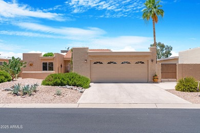 Come see the beautiful sunset views of the golf course and lake on Cottonwood Country Club in Arizona - for sale on GolfHomes.com, golf home, golf lot