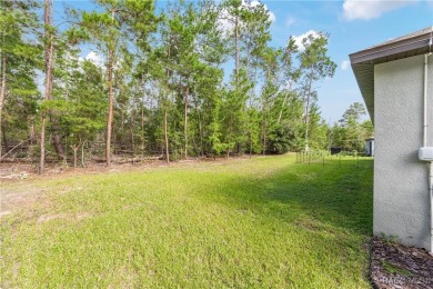 Welcome to your Florida dream home nestled on a large private on Sugarmill Woods Golf and Country Club in Florida - for sale on GolfHomes.com, golf home, golf lot