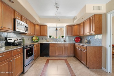 Come see the beautiful sunset views of the golf course and lake on Cottonwood Country Club in Arizona - for sale on GolfHomes.com, golf home, golf lot