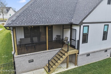 Emitting quality, comfort, and warmth, this pristine home makes on Tellico Village Golf Club in Tennessee - for sale on GolfHomes.com, golf home, golf lot