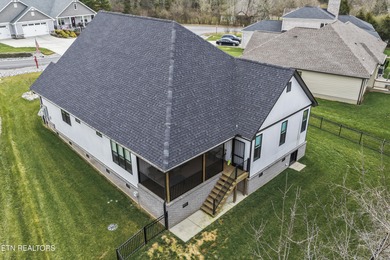 Emitting quality, comfort, and warmth, this pristine home makes on Tellico Village Golf Club in Tennessee - for sale on GolfHomes.com, golf home, golf lot
