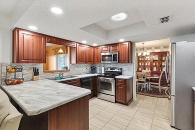 **NEW ROOF & HVAC** This 3/2/2 Magnolia is 1,852 sq ft of on The Links of Spruce Creek in Florida - for sale on GolfHomes.com, golf home, golf lot