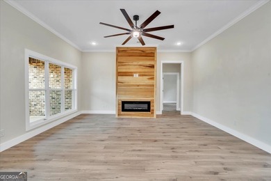 Beautiful 4 bedroom, 2 bath home located in a quiet neighborhood on Southern Hills Golf Club in Georgia - for sale on GolfHomes.com, golf home, golf lot