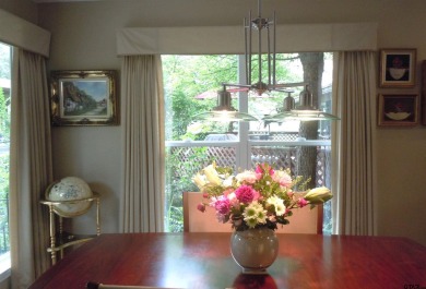 A rarity and a real beauty. Chic best describes this townhome on Holly Lake Ranch Golf Club in Texas - for sale on GolfHomes.com, golf home, golf lot