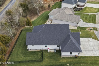 Emitting quality, comfort, and warmth, this pristine home makes on Tellico Village Golf Club in Tennessee - for sale on GolfHomes.com, golf home, golf lot