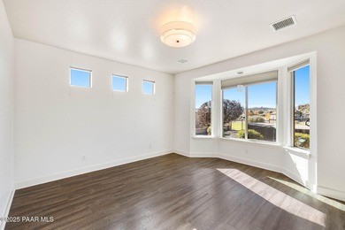 Located on the 9th hole of The Club at Prescott Lakes, this on Prescott Lakes Golf and Country Club in Arizona - for sale on GolfHomes.com, golf home, golf lot