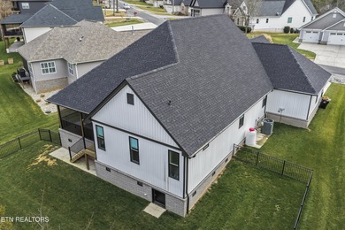 Emitting quality, comfort, and warmth, this pristine home makes on Tellico Village Golf Club in Tennessee - for sale on GolfHomes.com, golf home, golf lot