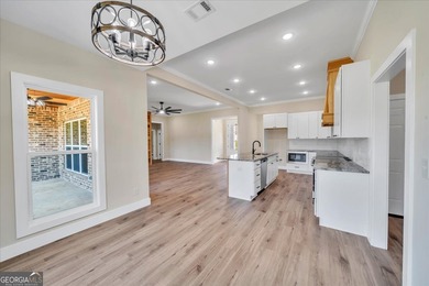 Beautiful 4 bedroom, 2 bath home located in a quiet neighborhood on Southern Hills Golf Club in Georgia - for sale on GolfHomes.com, golf home, golf lot