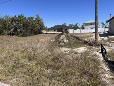 A spacious lot is now available, comprising three parcels (11 on Del Tura Golf and Country Club in Florida - for sale on GolfHomes.com, golf home, golf lot