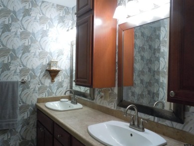 A rarity and a real beauty. Chic best describes this townhome on Holly Lake Ranch Golf Club in Texas - for sale on GolfHomes.com, golf home, golf lot