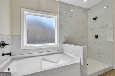 Beautiful 4 bedroom, 2 bath home located in a quiet neighborhood on Southern Hills Golf Club in Georgia - for sale on GolfHomes.com, golf home, golf lot