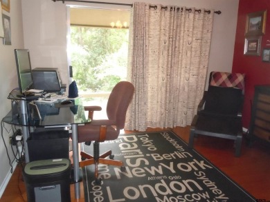 A rarity and a real beauty. Chic best describes this townhome on Holly Lake Ranch Golf Club in Texas - for sale on GolfHomes.com, golf home, golf lot