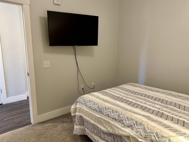 The Breeze Condos are located along the shores of beautiful on Sunrise Pointe Golf Course in Iowa - for sale on GolfHomes.com, golf home, golf lot