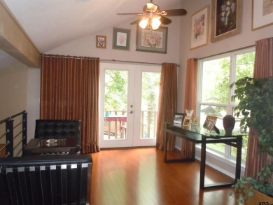 A rarity and a real beauty. Chic best describes this townhome on Holly Lake Ranch Golf Club in Texas - for sale on GolfHomes.com, golf home, golf lot