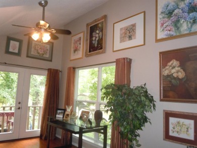 A rarity and a real beauty. Chic best describes this townhome on Holly Lake Ranch Golf Club in Texas - for sale on GolfHomes.com, golf home, golf lot