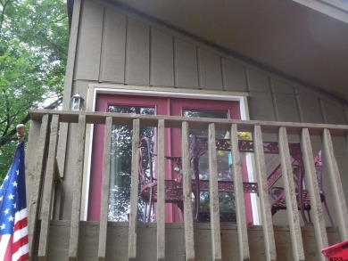 A rarity and a real beauty. Chic best describes this townhome on Holly Lake Ranch Golf Club in Texas - for sale on GolfHomes.com, golf home, golf lot