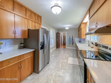 Dreaming of the perfect blend of modern living and country on La Follette Country Club in Tennessee - for sale on GolfHomes.com, golf home, golf lot