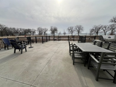 The Breeze Condos are located along the shores of beautiful on Sunrise Pointe Golf Course in Iowa - for sale on GolfHomes.com, golf home, golf lot
