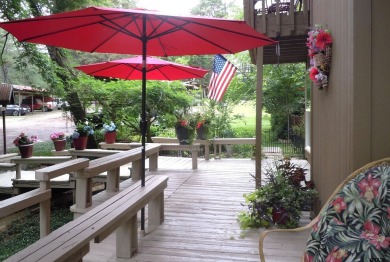 A rarity and a real beauty. Chic best describes this townhome on Holly Lake Ranch Golf Club in Texas - for sale on GolfHomes.com, golf home, golf lot