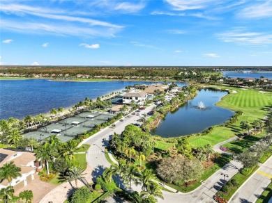 Experience luxury living in the prestigious lakefront community on The Golf Lodge At the Quarry in Florida - for sale on GolfHomes.com, golf home, golf lot