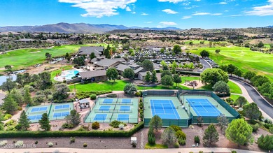 Located on the 9th hole of The Club at Prescott Lakes, this on Prescott Lakes Golf and Country Club in Arizona - for sale on GolfHomes.com, golf home, golf lot