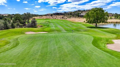 Located on the 9th hole of The Club at Prescott Lakes, this on Prescott Lakes Golf and Country Club in Arizona - for sale on GolfHomes.com, golf home, golf lot