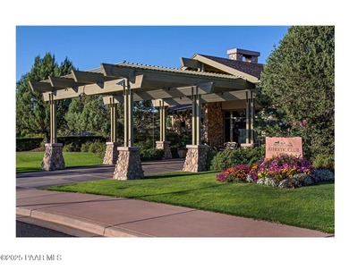 Located on the 9th hole of The Club at Prescott Lakes, this on Prescott Lakes Golf and Country Club in Arizona - for sale on GolfHomes.com, golf home, golf lot